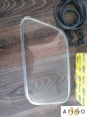 Стекло фары Mercedes Actros/Axor HELLA новое